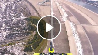 Riding a bike on a 200m high rail Fabio Wibmer