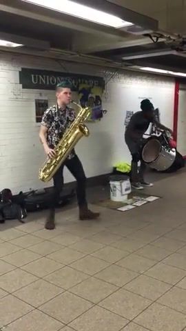 This is talent saxophone, drum, union square, drums, new york, drummer, talent, saxophone, n y, tourist destination, union square, music.