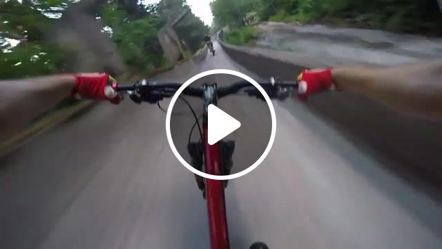 Bikers speed through abandoned bobsled track, sports. #0