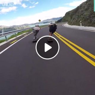 These downhill skateboarders are crazy