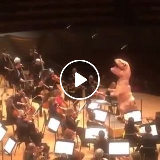 Juric park theme conducted by a dinosaur