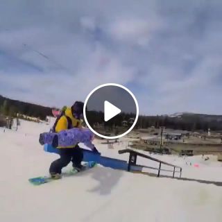Snowboarding with his daughter