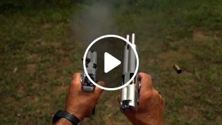 Double barreled pistol quad wield rapid fire 20 rounds in 1. 5 seconds in slowmo af 4k