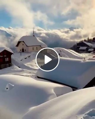 Beautiful snow covered village in Switzerland Shot by awesome globepix