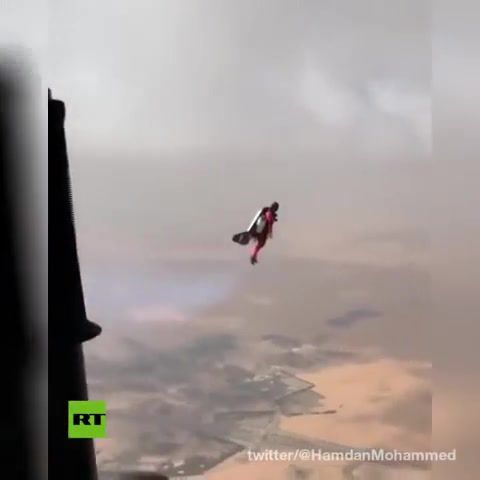 Iron Man Flies In The Sky Of Dubai Wearing Jetpack. Rt. Russia Today. Jetpack. Crown Prince. Dubai's Crown Prince. Flying. Flying With Jetpack. Helicopter. Iron Man. Uae. Emirates. Science Technology.