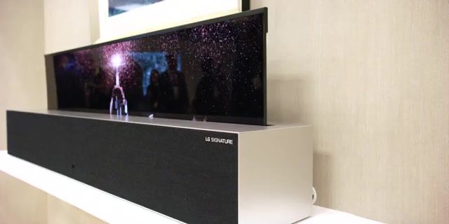 The rollable oled tv the potential is real, rollable tv, rolling tv, roll up tv, lg rollable, lg tv, ces, mkbhd, lg rollable tv, folding tv, modular tv, lg oled tv r, oled tv r, lg r, science technology.