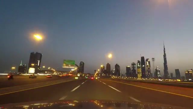 RushHours. Lifeisgood. Speeding. Nightride. Burj Khalifa. Dubai. Nature Travel.