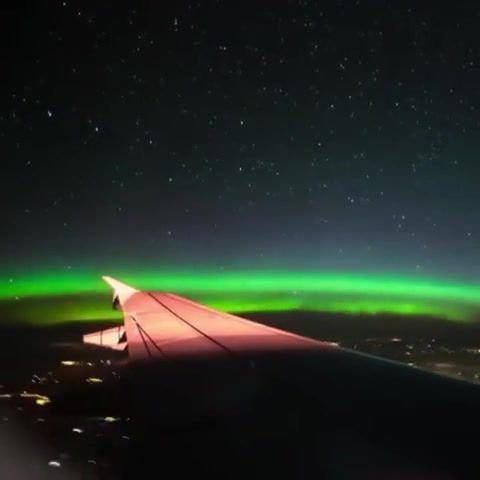 Northern lights from the plane, time, lapse, timelapse, vertical, join, dream, beat, music, groovy, airplane, deep, clip, hoh, up, city, window, plane, fly, free, night, trip, northern lights, gif, loop, lights, light, eleprimer, nature travel.