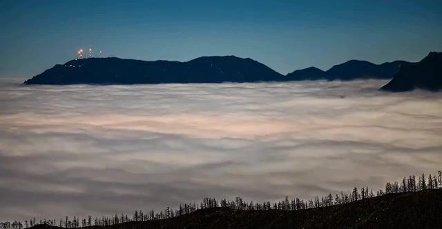 An ocean of clouds over colorado springs, live pictures.