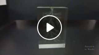 Lightning being trapped in an acrylic block