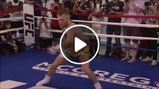 MCGREGOR warms up with weird arm swing and intense training regime