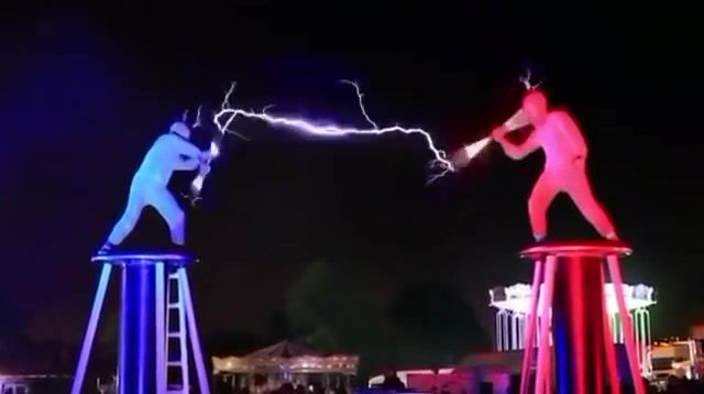 Electric fighting, battle, show, light, tesla, circle, science technology.