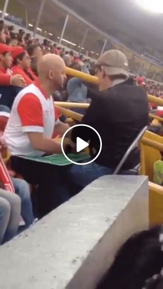Dad uses brilliant technique to allow his blind son to enjoy football match