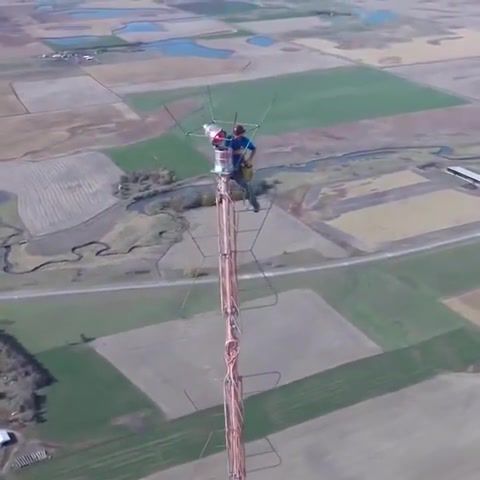 This is how you change the lightbulb at the top of a 1,500ft 457m television broadcast antenna