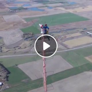 This is how you change the lightbulb at the top of a 1,500ft 457m television broadcast antenna