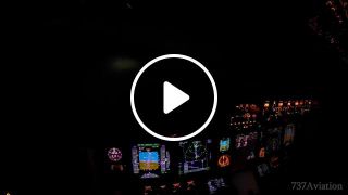 Boeing 737 flying in the night