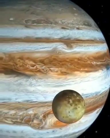 A gorgeous of jupiter and its volcanic moon io, cosmos, universe, jupiter, io, planets, nasa, omg, wtf, wow, science technology.