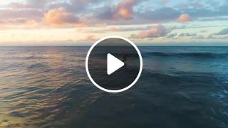 Surfing under the sunset