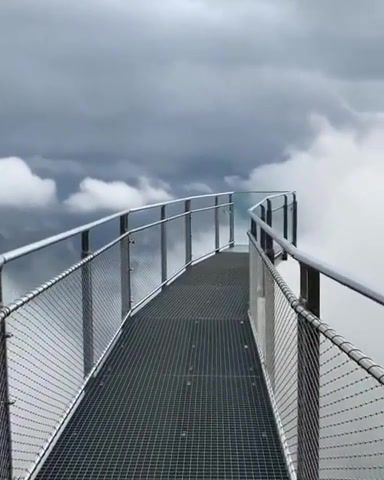 Beautiful cliff walk among the clouds in grindelwald, nature travel.