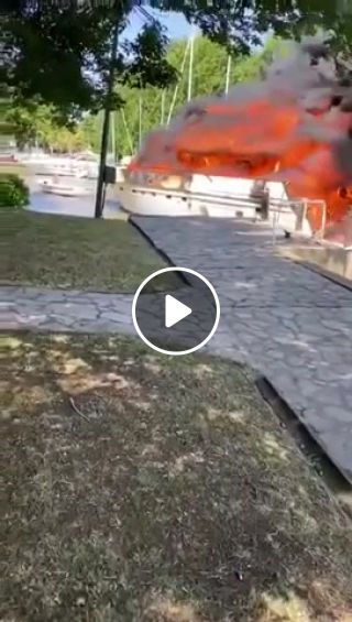 The boat on fire comes out of the marina