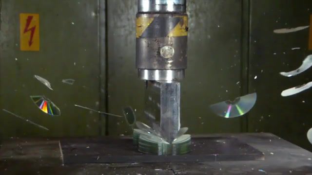 Formatting 200 cds with hydraulic press, hydraulic press channel, hydraulicpresschannel, hydraulic press, hydraulicpress, crush, willitcrush, destroy, press, hydraulicpress channel, hydraulic, hydraulic press man, will it crush, cutting, cut, cross section, cut in half, inside, whats inside, interesting, art, art design.