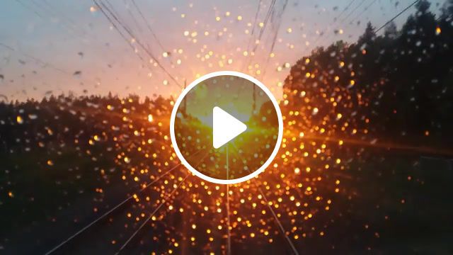 A few words in title, sunset, raindrops, train, nature travel. #0