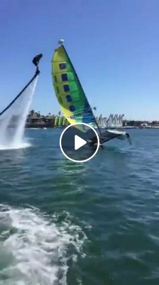Jetboarder rescues flipped over catamaran