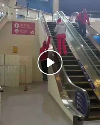 Casual penger on the escalator