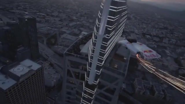 Human Meteor Skydives Through Skyscrapers - Video & GIFs | red bull,redbull,action sports,extreme sports,skydiving,meteor,la meteor,downtown los angeles,wingsuit,red bull meteor,red bull air force,skydive,wingsuiting,meteor supermoon,supermoon,miles daisher,precision flying,people are awesome,jumps,pov,people are crazy,meteorite meme,supermoon skydive,skydive meteor,meteor stunt,aerial,helicopter jump,heli drop,meteor jump,wingsuit landing,sports