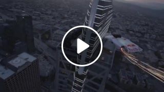 Human Meteor Skydives Through Skyscrapers