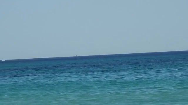 Flat earth proof nikon p900 boat and buoy in far distant horizon no drop, nature travel.