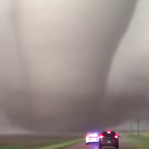 Monster tornado tearing through dodge city, tornado, weather, nature travel.