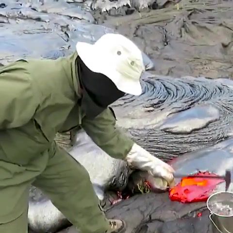 This is how geologists collect lava samples from an active volcano - Video & GIFs | wonder of science,volcano,lava,hans zimmer,the dark knight,hot,danger,hard work,man,nature travel