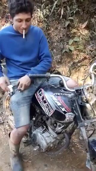 Don't Imitate This Guy, You Could Burn Your Motorbike. Funny. Motobike. Smoke. Funny Videos. Fire. Finger.
