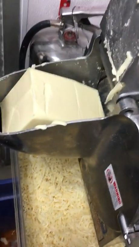 Shredding cheese, satisfying, funny, cheese.