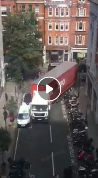 Driver heavy trucks through tight bend