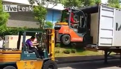 Creative at work - forklifts lifting forklifts, forklifts, large package, truck, freight, creative at work, funny.