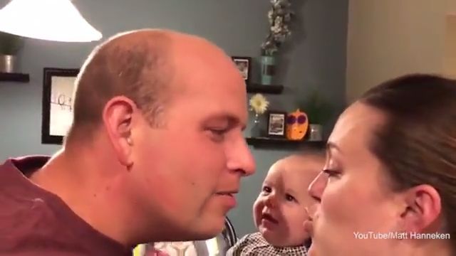 The baby is extremely adorable, baby, parents, funny, kiss, cry.