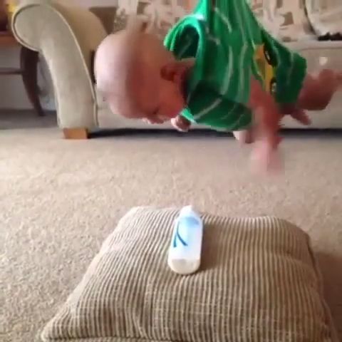 Mission impossible 101, cute baby, funny, adorable baby, milk, pillow, milk bottle.