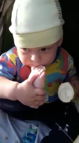Funny baby eating ice cream with foot, funny, baby, ice cream, foot.